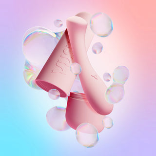 Pink VUSH Shine G Spot vibrator and pink case against purple/blue/pink gradient background with illustrated iridescent bubbles